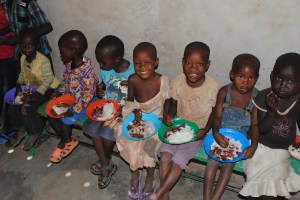 Beautiful children enjoying a meal in Lokichoggio...